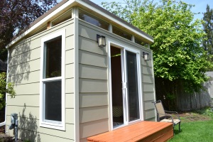 Kevin and Erin share space in their 10' by 12' Modern-Shed home office.