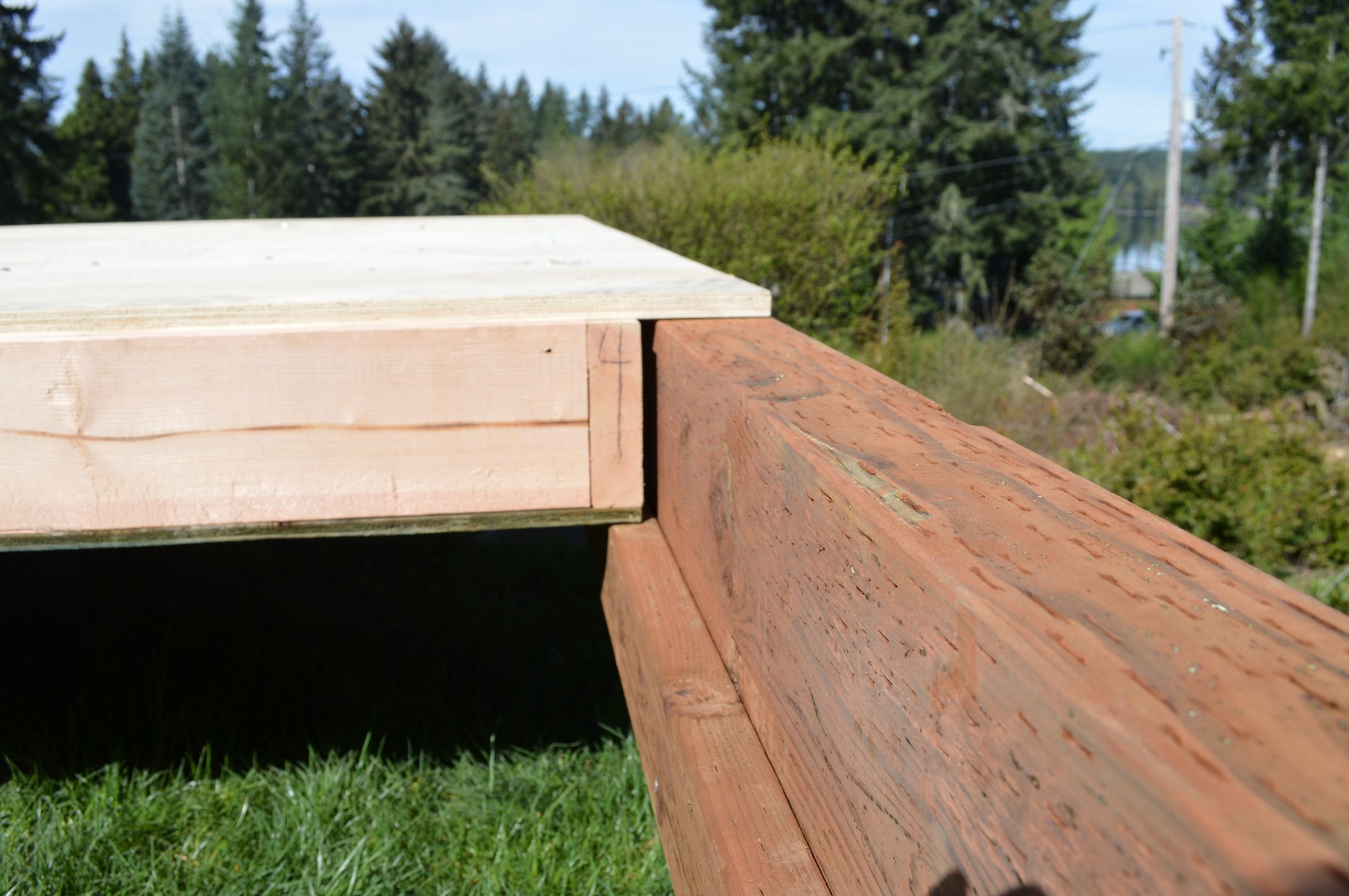 Modern Shed floor system panel rest snugly on PERIMETER BEAMs