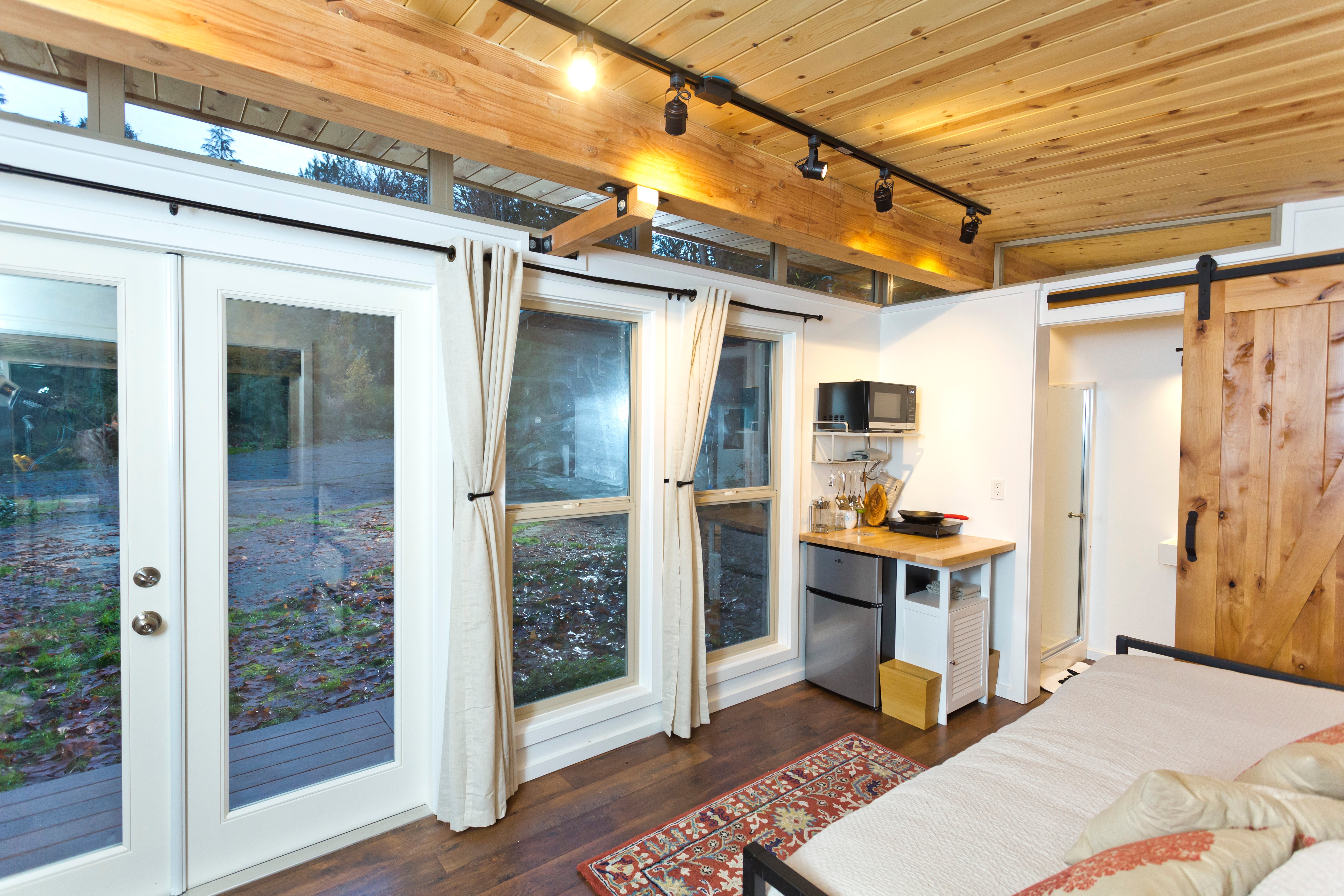 Mini fridge and microwave in a studio shed