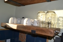 The shelves are made with reclaimed wood from an artist on Etsy