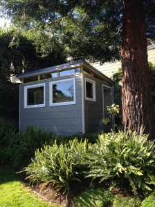 This Modern-Shed home office sits under a Redwood tree and provides a quiet spot for reading and relaxing.