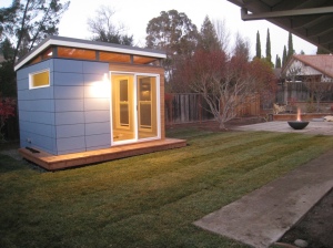 This Modern-Shed home office features open-joint siding and clerestory windows.