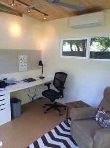 This 10' by 12' Modern-Shed serves as an office and work space for Jim.