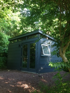 This 14' by 14' Modern-Shed garden studio blends well with David's home.