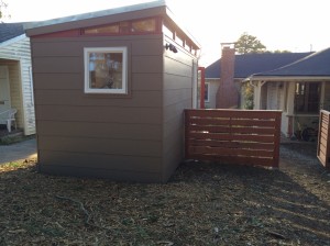 Neighbors complement the Modern-Shed home office as they pass it in the street.