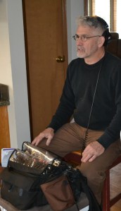 MSNBC sound tech Bill Ruth sets up in Modern-Shed GM Tim Vack's living room in Port Orchard, Wash.