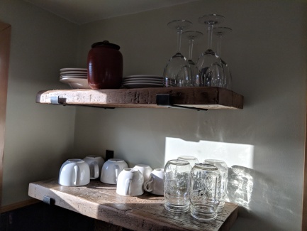 The shelves are made with reclaimed wood from an artist on Etsy