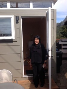 Marianne with her 8' by 10' Modern-Shed art studio.