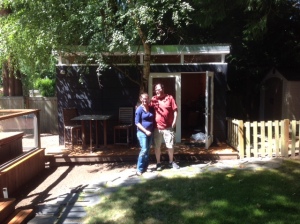 Cory and Jeremy in front of the first Modern-Shed on their property, which they turned into a studio and then a guest suite.