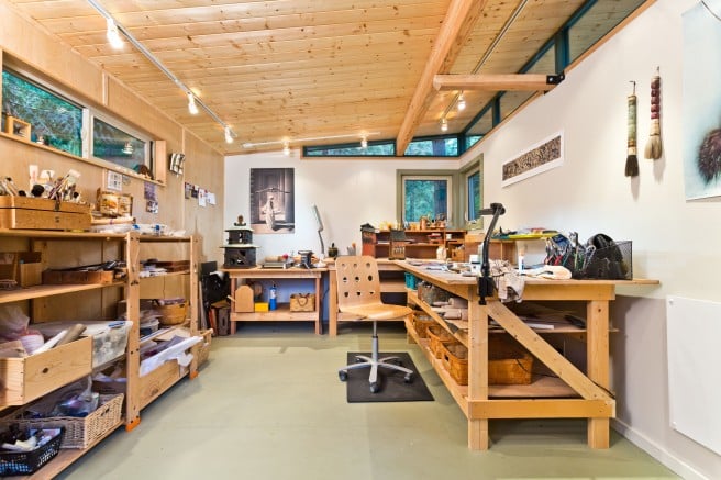 Lin wanted a blank wall for inspiration above her desk, and windows set up high for privacy and ventilation.