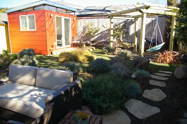 The 10' by 12' Modern-Shed home office/play room complements the Hakoshima/Richardson backyard well.